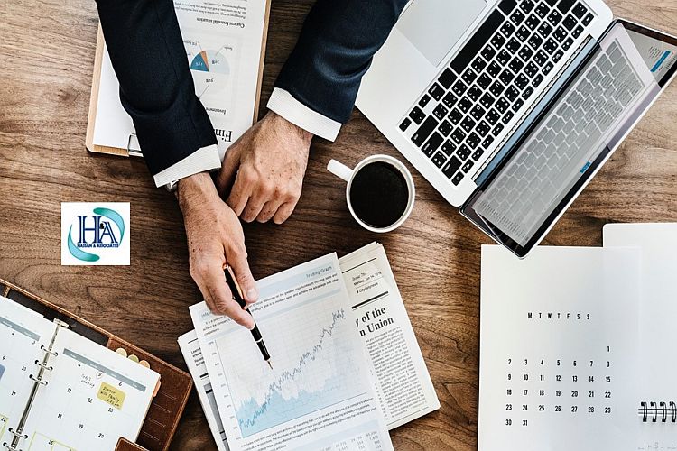 Professional tax advisor reviewing documents